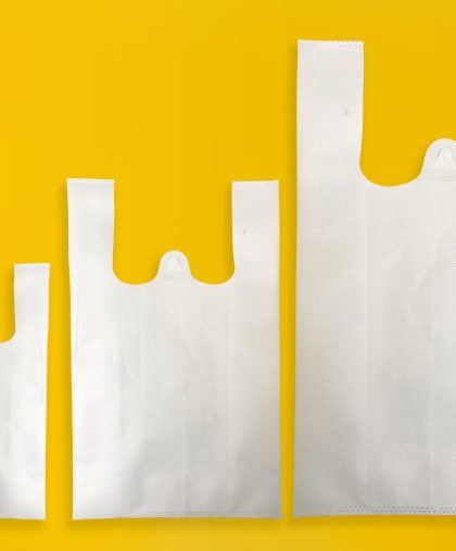 Beautiful Non Woven Grocery Shopping Bag with yellow background. Tote ECO Bags